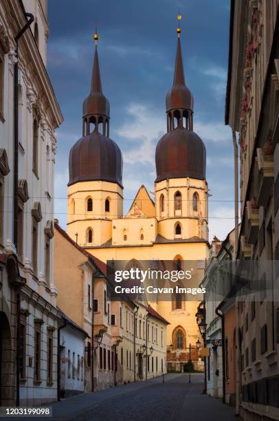 basilica of st nicholas in the old town of trnava, slovakia. - trnava imagens e fotografias de stock