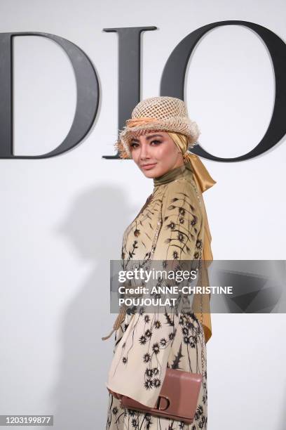 Malaysian actress Neelofa Noor poses during the photocall prior to the Dior Women's Fall-Winter 2020-2021 Ready-to-Wear collection fashion show in...