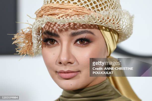 Malaysian actress Neelofa Noor poses during the photocall prior to the Dior Women's Fall-Winter 2020-2021 Ready-to-Wear collection fashion show in...