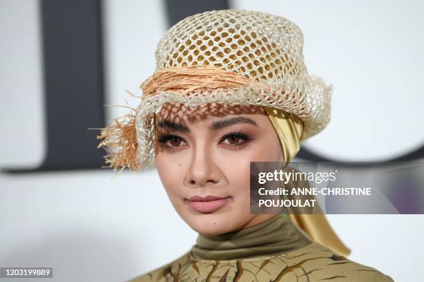 Malaysian actress Neelofa Noor poses during the photocall prior to the Dior Women's Fall-Winter 2020-2021 Ready-to-Wear collection fashion show in...