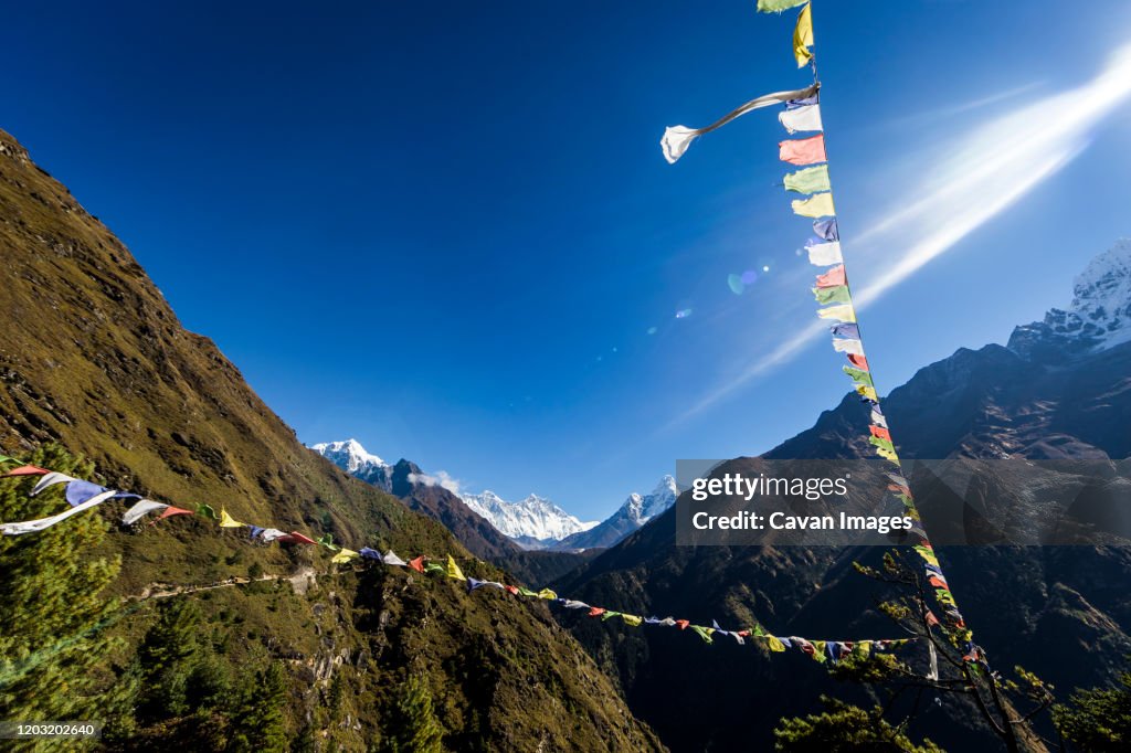 Prayer flags, Ama Dablam and Himalays in the Everest region of Nepal