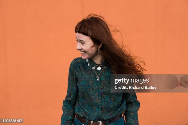 red haired woman with nose rings - alternative pose stock pictures, royalty-free photos & images