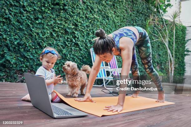 another ordinary mom's day - children yoga stock pictures, royalty-free photos & images