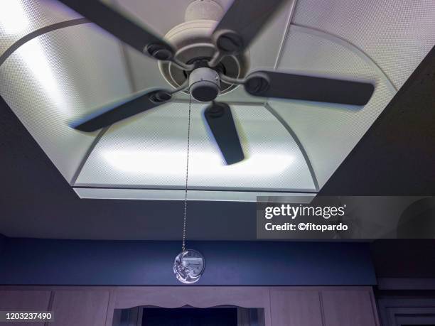 ceiling fan in motion - luce fluorescente foto e immagini stock