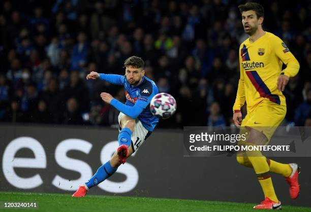 Napoli's Belgian forward Dries Mertens shoots the ball during the UEFA Champions League round of 16 first-leg football match between SSC Napoli and...