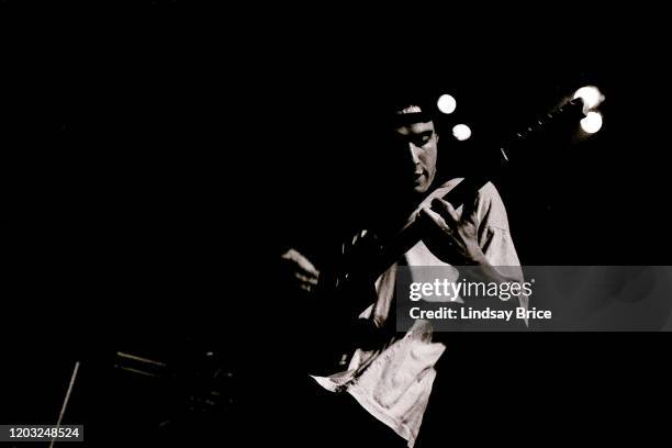 Adam “Ad-Rock” Horovitz on guitar performs in Beastie Boys at the Universal Amphitheatre in Universal City on November 24, 1992 in Los Angeles.