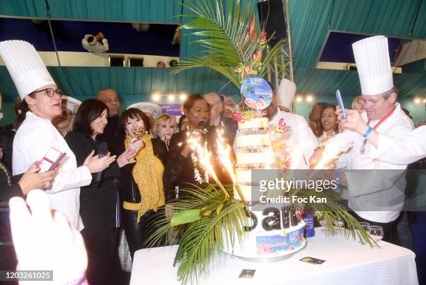 General view of atmosphere of the cake with Mayor Anne Hidalgo, Daniele Evenou, Sophie Darel, Chef Babette de Rozières, Chef Eric Briffard and guests...