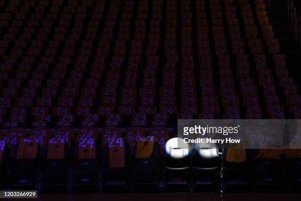 The Los Angeles Lakers honor Kobe Bryant and daughter Gigi by spotlighting empty courtside seats before the game against the Portland Trail Blazers...