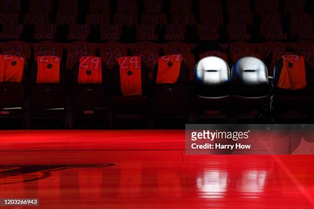 The Los Angeles Lakers honor Kobe Bryant and daughter Gigi by spotlighting empty courtside seats before the game against the Portland Trail Blazers...