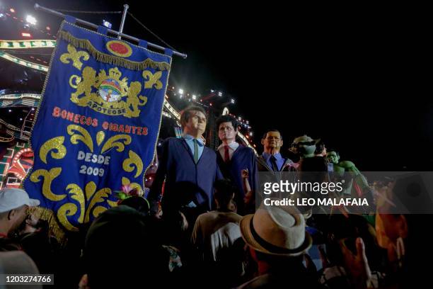 Giant puppets of Brazilian President Jair Bolsonaro , Justice Minister Sergio Moro and Vice-President Hamilton Mourao are seen during a traditional...