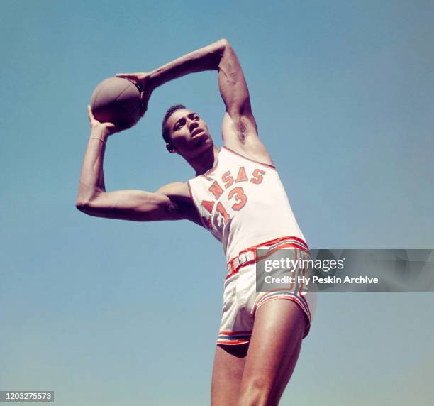 Wilt Chamberlain of the University of Kansas Jayhawks poses for a portrait circa 1957 in Lawrence, Kansas.