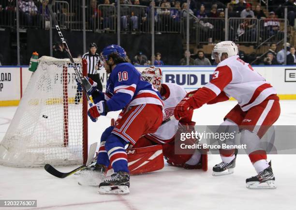 Artemi Panarin of the New York Rangers scores at 19:18 of the second period against Jimmy Howard of the Detroit Red Wings at Madison Square Garden on...