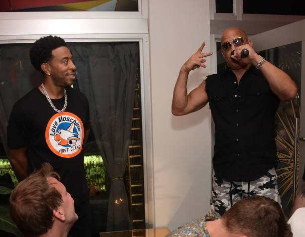 Chris "Ludacris" Bridges and Vin Diesel speak at the Fast & Furious F9 After Party at Kaido Miami on January 31, 2020 in Miami, Florida.