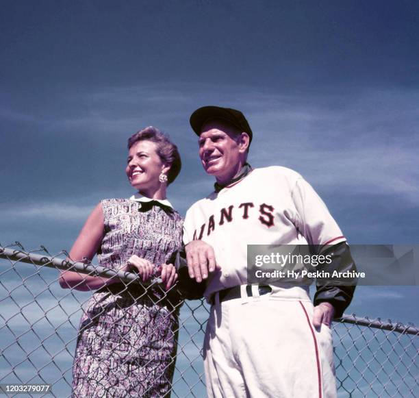 Manager Leo Durocher of the New York Giants poses for a portrait with his wife, actress Laraine Day during Spring Training on March 2, 1955 in...
