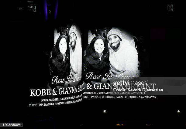 Electronic billboard displayed at LA Live to honor Kobe and daughter Gigi Bryant before the game between the Los Angeles Lakers and the Portland...