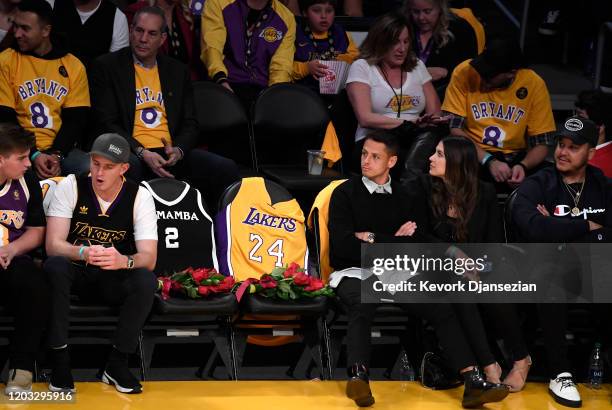 The Los Angeles Lakers honor Kobe Bryant and daughter Gigi by covering the courtside seats they occupied with flowers, Gigi's Mamba jersey and Kobe's...