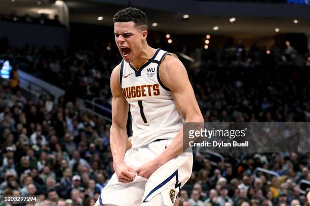 Michael Porter Jr. #1 of the Denver Nuggets celebrates in the third quarter against the Milwaukee Bucks at the Fiserv Forum on January 31, 2020 in...
