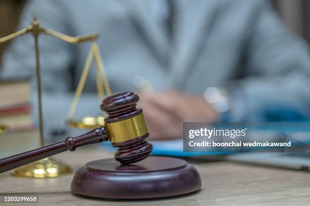 judge gavel with justice lawyers, businesswoman in suit or lawyer, advice and legal services concept. - prosecutor stock-fotos und bilder
