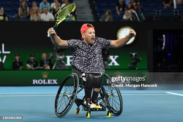 Dylan Alcott of Australia celebrates winning championship point during his Quad Wheelchair Singles Final match against Andy Lapthorne of Great...