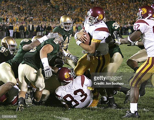 Quarterback Matt Leinart scores the winning touchdown with only :03 remaining versus Notre Dame in South Bend, Indiana, Oct. 15, 2005. USC remained...