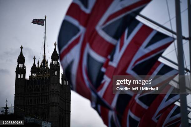 Union Jack flags hang in parliament square on February 1, 2020 in London, England. Last night Brexit supporters celebrated at 11.00pm as the UK and...