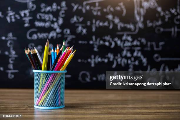 colored pencils on the blackboard background - 覚悟 ストックフォトと画像