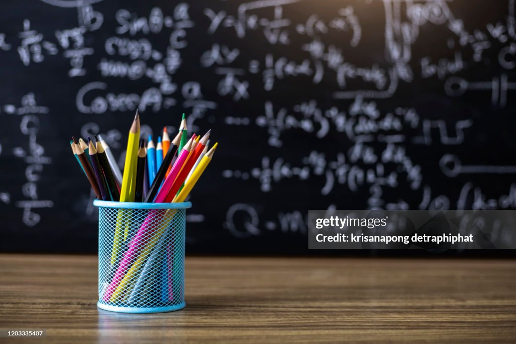Colored Pencils On The Blackboard Background High-Res Stock Photo - Getty  Images