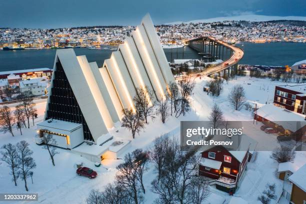 arctic cathedral and tromso bridge - scandinavian church stock pictures, royalty-free photos & images