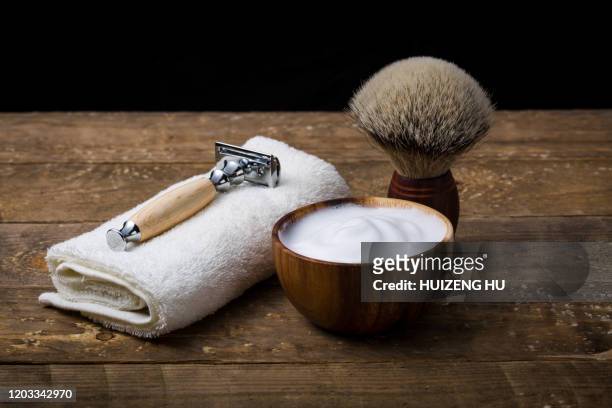 shaving accessories, razor, brush, towel and foam prepared for shaving. - wood shaving stock pictures, royalty-free photos & images