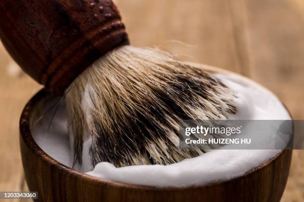 shaving brush and bowl on table. shaving accessories - shaving brush fotografías e imágenes de stock