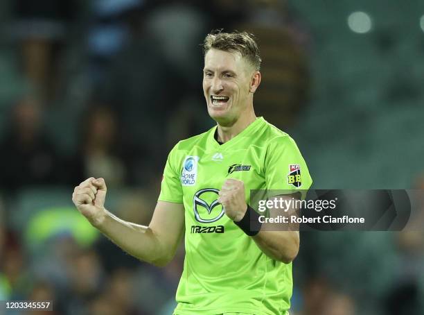 Chris Morris of the Sydney Thunder celebrates after the Sydney Thunder defeated the Strikers during the Big bash League Finals match between the...