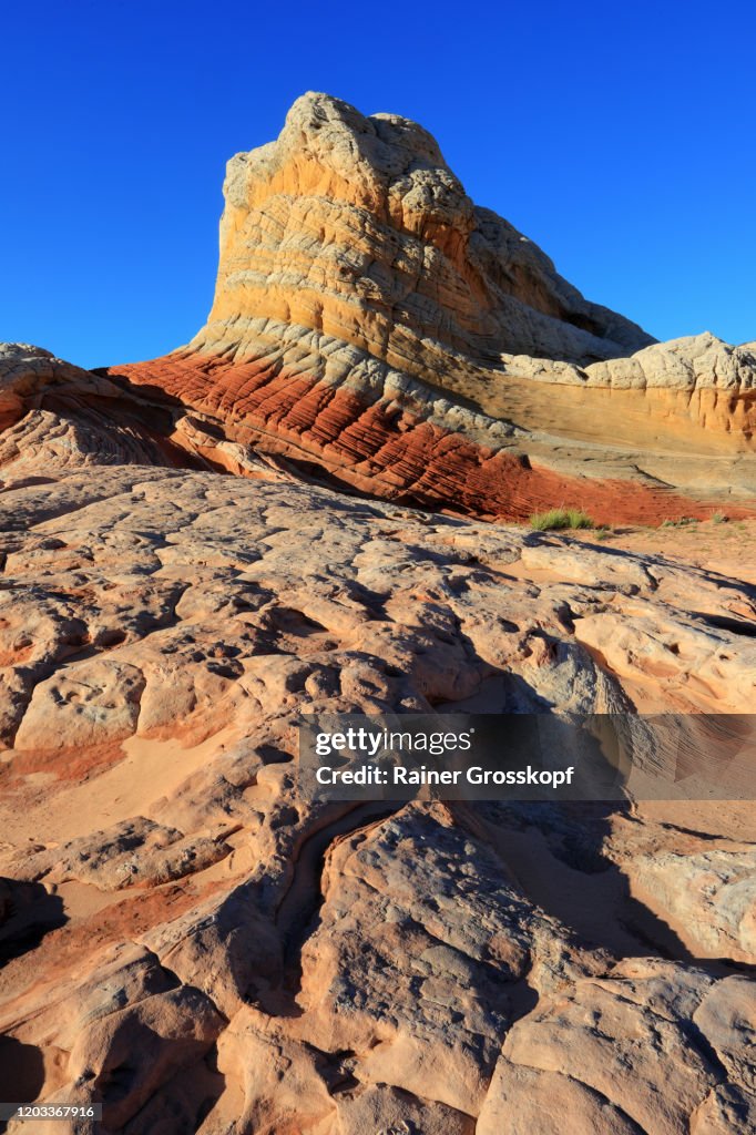 Colorfule striped sandstone rocks in a desert landscape