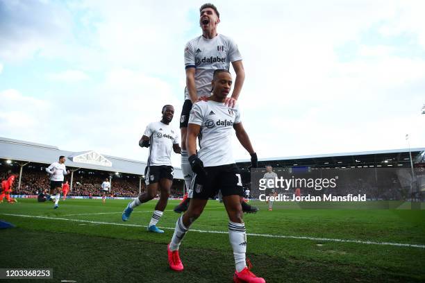 Bobby Decordova-Reid of Fulham celebrates scoring his sides first goal during the Sky Bet Championship match between Fulham and Huddersfield Town at...