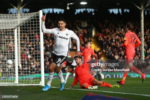 Aleksandar Mitrovic of Fulham celebrates scoring his sides third goal during the Sky Bet Championship match between Fulham and Huddersfield Town at...