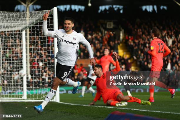 Aleksandar Mitrovic of Fulham celebrates scoring his sides third goal during the Sky Bet Championship match between Fulham and Huddersfield Town at...