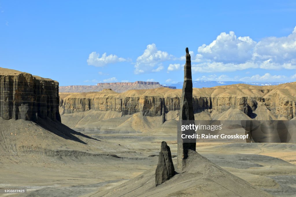 High and thin rock needles in a desert landscape