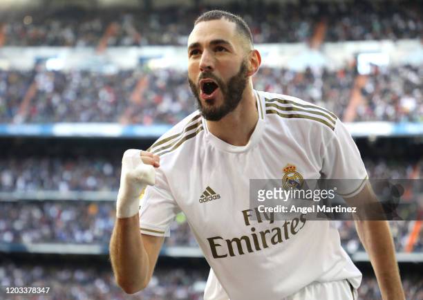 Karim Benzema of Real Madrid celebrates after scoring his team's first goal during the La Liga match between Real Madrid CF and Club Atletico de...