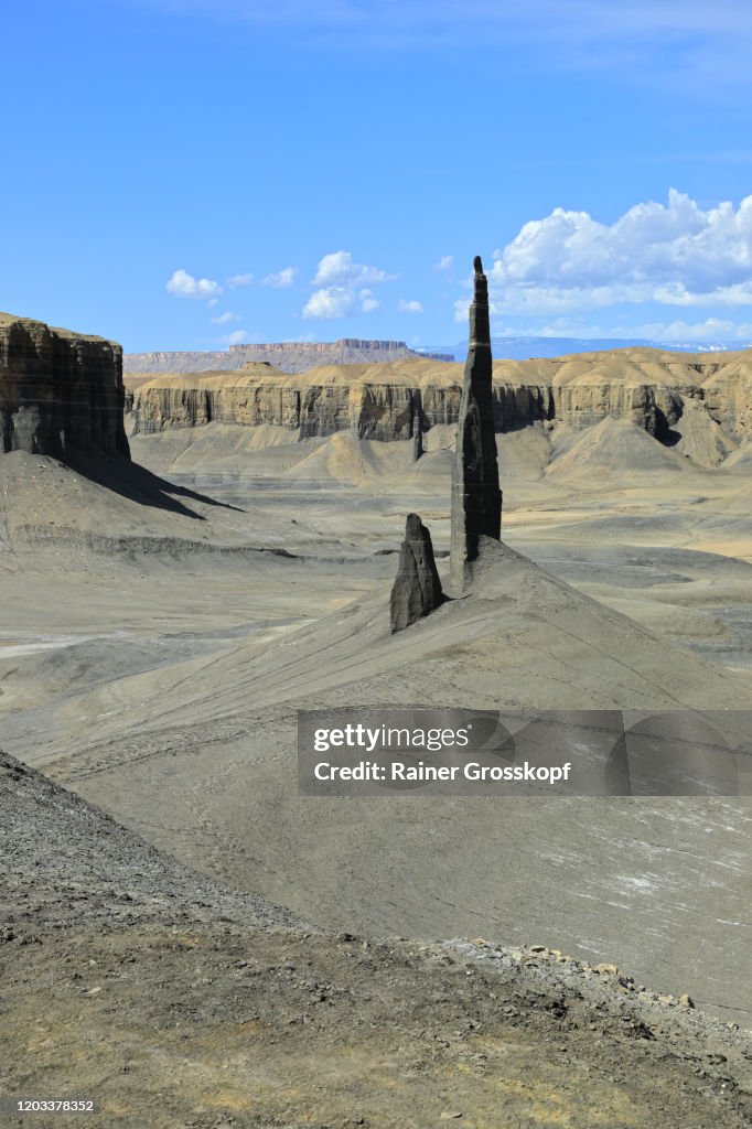 High and thin rock needles in a desert landscape