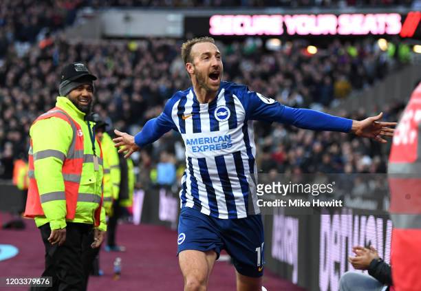Glenn Murray of Brighton and Hove Albion celebrates after scoring his team's third goal during the Premier League match between West Ham United and...