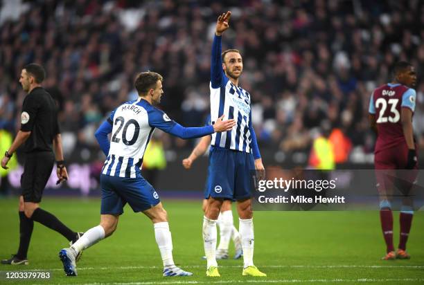 Glenn Murray of Brighton and Hove Albion celebrates with Solomon March after scoring his team's third goal during the Premier League match between...