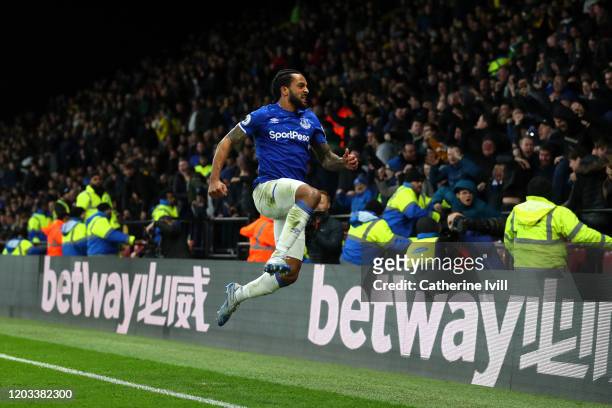 Theo Walcott of Everton celebrates after scoring his team's third goal during the Premier League match between Watford FC and Everton FC at Vicarage...