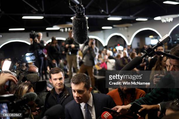 Democratic presidential candidate former South Bend, Indiana Mayor Pete Buttigieg answers questions from the media after speaking at a Get Out The...
