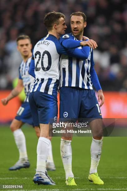 Glenn Murray of Brighton & Hove Albion celebrates with team mate Solly March after equalising during the Premier League match between West Ham United...