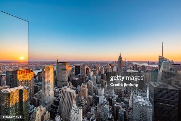 new york city skyscrapers at dusk, usa - new york city sunrise stock pictures, royalty-free photos & images