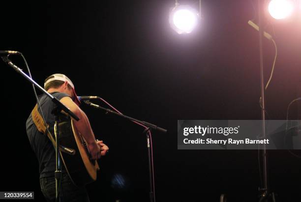 Country Star Justin Moore performs live at the Golf and Guitars charity event on May 18, 2010 at the Alister MacKenzie Golf Course at Haggin Oaks in...