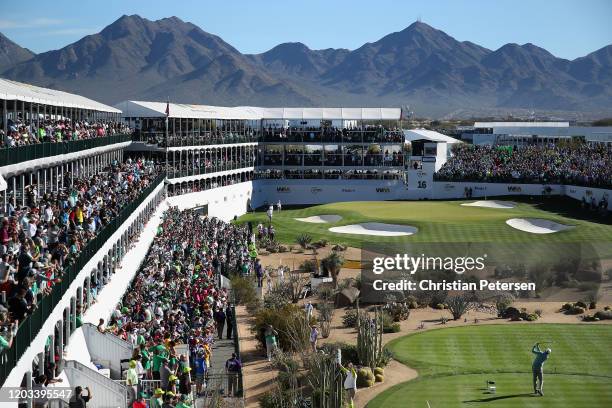 Matt Kuchar plays a tee shot on the 16th hole during the third round of the Waste Management Open at TPC Scottsdale on February 01, 2020 in...