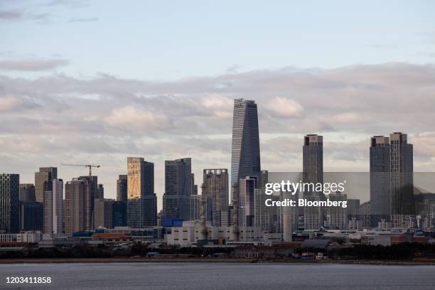 Commercial and residential buildings stand in the Songdo International Business District of Incheon, South Korea, on Tuesday, Feb. 25, 2020. South...