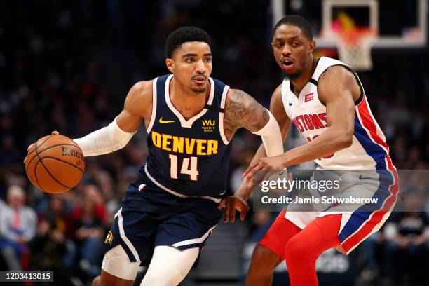 Gary Harris of the Denver Nuggets drives past Brandon Knight of the Detroit Pistons at Pepsi Center on February 25, 2020 in Denver, Colorado. NOTE TO...