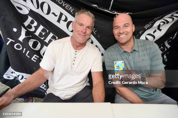 Brett Favre and Matt Hasselbeck let it go during Poo-Pourri's Giant Poo In Miami at The Wynwood Marketplace on February 01, 2020 in Miami, Florida.