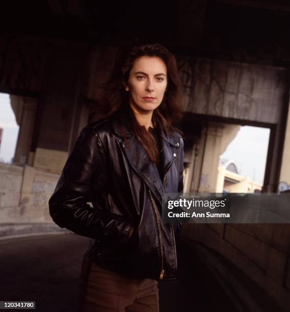 Director Kathryn Bigelow poses for a portrait session in the LA River and under the 6th St. Bridge on January 1, 1989 in Los Angeles, California.